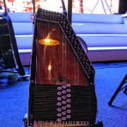 Rob and Eric were fighting for who could have more playing time on the autoharp.   (photo by Randy Brown)