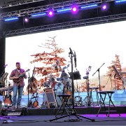 Doing their thing – a couple of mandolins and drums.   (photo by Danl Blackwood)