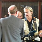 I am trying to tell Doug Jones (back to camera) in between songs that I'd love to get involved with the Jayhawk Theatre renovation project, of which he was president and the time.