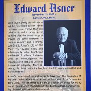 The poster for Ed Asner's induction on display in the Mezzanine at the Great Overland Station Museum.