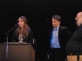 Lt. Governor Jeff Colyer (center) and his daughter Serena (left) joined by Bill Lee (right) as Serena reads the proclamation from Governor Brownback honoring Kansas Music Hall of Fame.