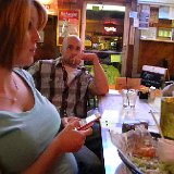 a pregnant Christi and her hubby Mike relaxing after dinner. (Christi asked me to &#34;crop&#34; out her food. OK, I will .... real soon! ....  I promise... )  Christi had a baby girl Brenna just a couple months later.