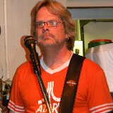 I&#39;m not bored! Really I&#39;m not! I&#39;m  ...  contemplating!  ...  Yeah!  that&#39;s the ticket!  actually I&#39;m thinking ... &#34;sure do miss getting to jam with these folks...&#34;